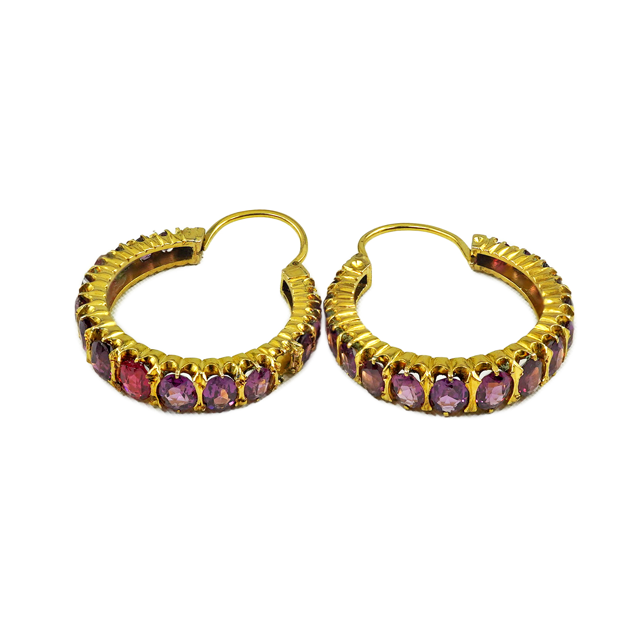 A pair of gold and graduated pink sapphire cluster set hoop earrings